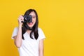 Asian woman smiling pretty girl in white shirt taking photo on camera Royalty Free Stock Photo