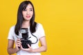 Asian woman smiling pretty girl in white shirt taking photo on camera Royalty Free Stock Photo