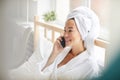 Asian Woman Speaking by Phone Royalty Free Stock Photo