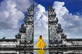 Asian woman standing at Lempuyang Luhur temple in Bali, Indonesia