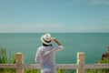 Asian woman standing relax on cliff. Royalty Free Stock Photo