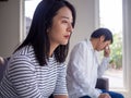 An Asian woman is stressed and anxious about the love problems between her husband after an intense quarrel. Royalty Free Stock Photo