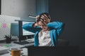 Asian woman is stressed while working on laptop, tired asian businesswoman with headache at office, feeling sick at work, Stressed Royalty Free Stock Photo