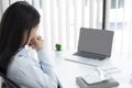 Asian woman is studying online via the internet with a cheerful smile, stay home, New normal Royalty Free Stock Photo