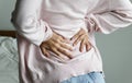 Asian woman suffering back pain Royalty Free Stock Photo