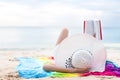 Asian woman sun bathing and reading books in holiday at beach. B