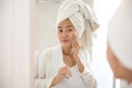 Asian woman taking care her face Royalty Free Stock Photo