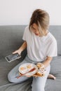 Woman taking photo of her easy and simple homemade breakfast. Royalty Free Stock Photo