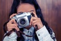 Asian woman taking picture with digital camera Royalty Free Stock Photo