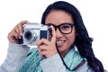 Asian woman taking picture with digital camera Royalty Free Stock Photo
