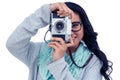 Asian woman taking picture with digital camera Royalty Free Stock Photo