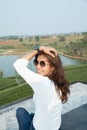 Asian woman with tea plantation view