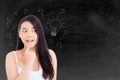 Asian woman thinking with drawing question mark Royalty Free Stock Photo