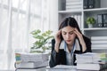 asian woman thinking hard concerned about online problem solution looking at laptop screen, worried serious asian Royalty Free Stock Photo