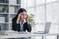 asian woman thinking hard concerned about online problem solution looking at laptop screen, worried serious asian Royalty Free Stock Photo