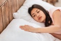 Asian Woman Touching Pillow Lying In Bed Alone After Breakup Royalty Free Stock Photo