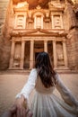 Asian woman tourist holding hand in Petra, Jordan Royalty Free Stock Photo