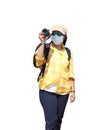 Asian woman tourist wearing face mask taking photograph isolated on white background