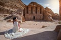 Asian woman tourist sitting in Petra, Jordan Royalty Free Stock Photo