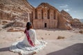 Asian woman tourist sitting in Petra, Jordan Royalty Free Stock Photo