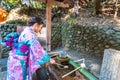 Asian women in traditional japanese kimonos at Fushimi Inari Shrine in Kyoto, Japan Royalty Free Stock Photo