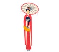 Asian woman in traditional red kimono holding a paper fan and umbrella. Elegant geisha with hair ornaments. Japanese Royalty Free Stock Photo