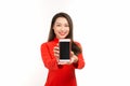 Asian woman in traditional vietnamese dress, presenting mobile screen or application for digital business and technology concept