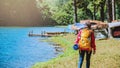 Asian woman travel nature. Travel to relax and yoga exercise at the lake  pang ung in Mae Hong Son, Thailand Royalty Free Stock Photo