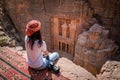 Asian woman traveler sitting in Petra, Jordan Royalty Free Stock Photo