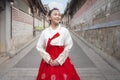 Asian woman traveler in traditional korean dress or hanbok dress Royalty Free Stock Photo