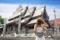 Asian woman traveller in white dress travel in Silver church Royalty Free Stock Photo