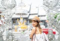 Asian woman traveller in white dress travel in Silver church Royalty Free Stock Photo