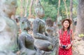 Asian woman traveller in white dress travel in wat Umong temple