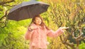 Asian woman with umbrella under the rain