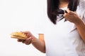 Woman weak hair her hold hairbrush with damaged long loss hair in comb brush on hand Royalty Free Stock Photo