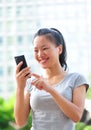 Asian woman use cellphone Royalty Free Stock Photo