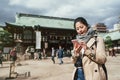 Asian woman using cellphone searching direction Royalty Free Stock Photo