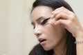 A asian woman is using mascara Royalty Free Stock Photo