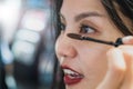 Asian woman using mascara for make up Royalty Free Stock Photo