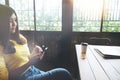 asian woman using smart phone at coffee shop. Royalty Free Stock Photo