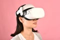 Asian woman using vr glasses, Watching movie and playing video games from virtual reality headset Royalty Free Stock Photo