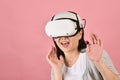 Asian woman using vr glasses, Watching movie and playing video games from virtual reality headset, Young woman amazed Royalty Free Stock Photo