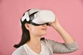 Asian woman using vr glasses, Watching movie and playing video games from virtual reality headset Royalty Free Stock Photo