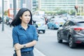 Asian woman waiting public transportation Royalty Free Stock Photo