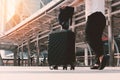 Asian woman walking to airport terminal with luggage. Business t Royalty Free Stock Photo