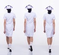 Asian Woman wear Nurse white uniform isolated walking