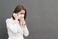 Asian woman wear protective face mask in pollution city with coughing Royalty Free Stock Photo