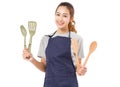 Asian Woman Wearing Apron And Showing Cooking Tools.