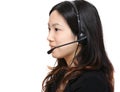Asian woman wearing headset Royalty Free Stock Photo