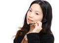 Asian woman wearing headset Royalty Free Stock Photo